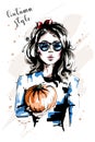 Hand drawn beautiful young woman holding pumpkin. Stylish elegant girl with red bow in her hair. Fashion woman in sunglasses. Royalty Free Stock Photo
