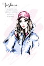 Hand drawn beautiful young woman portrait. Fashion woman in cap. Stylish cute girl with long hair. Fashion model in winter clothes