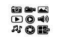 Hand drawn black multimedia icon set including camera, video recorder, image, play buttons, speaker, music notes, shutter, and Royalty Free Stock Photo