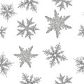 Hand drawn black and white snowflakes on the flat white background