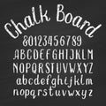 Hand drawn chalk board alphabet font. Upper and lower case letters and numbers on a distressed background.