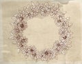 Hand drawn chamomile wreath on old paper background.