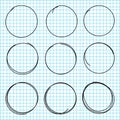 Hand drawn circle lines. Set of black scribble circles isolated on school notebook background