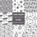 Hand drawn collection of Christmas and New Year doodles. Seamless hand-drawn New Year\'s patterns Royalty Free Stock Photo