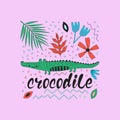 Hand drawn colorful crocodile with flowers and leaves.