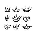 Hand drawn crown icon set in black color. Ink brush crowns background.