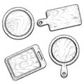 Hand drawn cutting wooden boards set. Sketch style kitchen utensils. Top view. Round and rectangular, with handle. Vector illustra Royalty Free Stock Photo