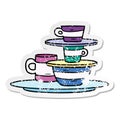 hand drawn distressed sticker cartoon doodle of colourful bowls and plates