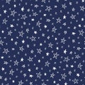 Hand drawn doodle stars on dark blue sky vector seamless pattern. Winter Christmas cute holiday background. Royalty Free Stock Photo