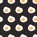 Hand drawn fried eggs with bright yellow yolk on black background. Yummy breakfast. Contemporary trendy vector pattern