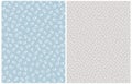 Hand Drawn Geometric Seamless Vector Patterns. White Abstract Petals Isolated on a Light Blue and Light Gray Backgrounds. Royalty Free Stock Photo