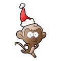 hand drawn gradient cartoon of a surprised monkey wearing santa hat Royalty Free Stock Photo