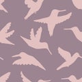 Hand drawn hummingbirds silhouette seamless pattern. Perfect for T-shirt, textile and print. Doodle vector illustration