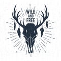 Hand drawn label with deer skull vector illustration and lettering.