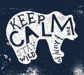 Hand drawn label with textured bear silhouette and lettering . Keep calm and stay wild at heart Royalty Free Stock Photo