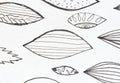 Hand-drawn leaf patterns on white background with various shapes and textures Royalty Free Stock Photo