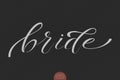 Hand drawn lettering Bride. Elegant modern handwritten calligraphy. Vector Ink illustration.