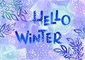 Hand drawn lettering winter phrase on multicolored Background. hello Winter - text on Watercolor blue, violet and purple Royalty Free Stock Photo