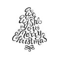 Hand drawn lettering. We wish you a merry christmas. Black ink calligraphy on white background. Christmas tree shape. Used for gre Royalty Free Stock Photo