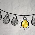 Hand drawn light bulb on wire doodle Royalty Free Stock Photo