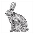 Hand drawn orante rabbit with ethnic floral doodle pattern