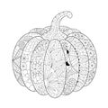 Hand-drawn pumpkin decorated with patterns, zentangle pattern, antistress coloring book for adults, halloween decor. Vector