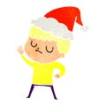 hand drawn retro cartoon of a grumpy boy wearing santa hat