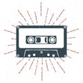 Hand drawn 90s themed badge with audio cassette tape grunge textured and vintage sunburst. Vector Royalty Free Stock Photo