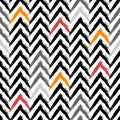 Hand-drawn seamless geometric pattern with colorful grunge texture. Multi-colored chevron pattern on  white background. Royalty Free Stock Photo