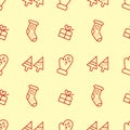 Hand-drawn seamless pattern with a Christmas or new year theme. Doodle Mittens, knitted socks, gift boxes and Christmas trees Royalty Free Stock Photo