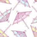 Hand drawn seamless pattern with cocktail umbrellas. Background for cafe, kitchen or food package
