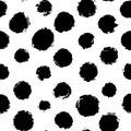 Hand drawn seamless pattern of rough black paint blots, spots or dots. Black and white ink spot texture. Vector Royalty Free Stock Photo