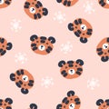 Hand drawn seamless pattern with tiger faces and snowflakes. Perfect for T-shirt, textile and print. Doodle vector illustration Royalty Free Stock Photo