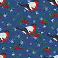 Hand drawn seamless pattern of winter bird bullfinch, berries, leaves, tree branches, snowflakes. Happy New Year and Christmas Royalty Free Stock Photo