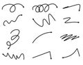 Hand drawn set of scribble curly and wavy black arrows. Collection of sketch doodle pointers showing direction Royalty Free Stock Photo