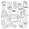 Hand drawn set of winter cloth doodle coloring