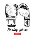 Hand drawn sketch of boxing gloves in black isolated on white background. Detailed vintage etching style drawing. Royalty Free Stock Photo