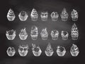 Hand-drawn sketch of ice cream balls, frozen yoghurt or cupcakes in ceramic cups and waffle baskets on chalkboard background. Set