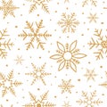 Hand drawn snowflake doodle seamless pattern. Delicate golden winter background. Beautiful texture abstract snow backdrop. Sketch