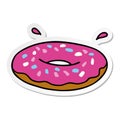 hand drawn sticker cartoon doodle of an iced ring donut