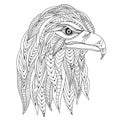 Hand drawn stylized silhouette of eagle head. Coloring book page antistress with predatory bird. Black and white outline logo,