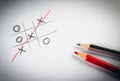 Hand drawn Tic Tac Toe game concept on the paper background. Royalty Free Stock Photo