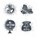 Hand drawn travelling labels set with globe, sneakers, backpack vector illustrations.
