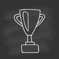 Hand drawn trophy Cup for winner on chalkboard. White outline on black background. Cute element in doodle style for card, social Royalty Free Stock Photo