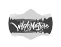 Hand drawn type lettering of Wild Nature with silhouette of mountains lake landscape Royalty Free Stock Photo