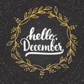 Hand drawn typography lettering phrase Hello, December isolated on the chalkboard background with golden wreath Royalty Free Stock Photo