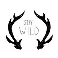 Hand drawn vector Deer horns with Stay Wild phrase. Royalty Free Stock Photo