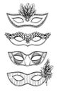 Hand drawn vector illustration - Carnival masks with feathers