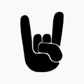 Hand drawn vector illustration of the rock and roll and heavy metal symbol made with a human hand showing devil horns Royalty Free Stock Photo