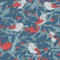 Hand drawn vector seamless pattern with birds, branches, leaves and rowanberry on blue dotted background